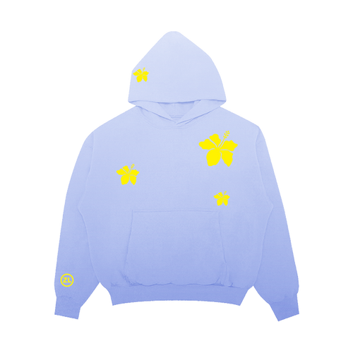 A light periwinkle blue pullover hoodie with yellow hibiscus flower graphics on the chest, hood, and sleeve, displayed against a solid white background.
