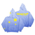 A light blue hooded sweatshirt shown from both front and back against a plain white background. The front features a kangaroo pocket and yellow butterfly and star graphics, while the back displays 'Midnight Surf' and 'Lumiere' in yellow text with a butterfly graphic.